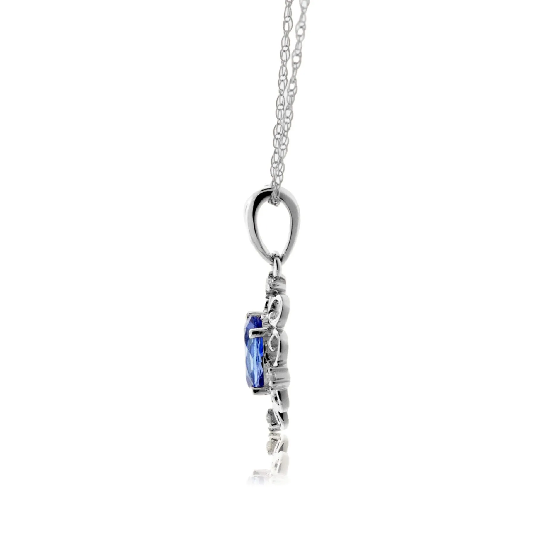 Oval-Cut Tanzanite Accented in Filigree Style Pendant